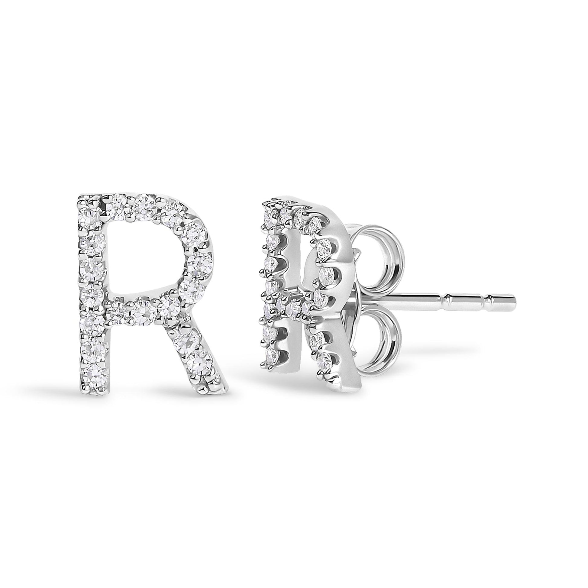 Close-up front and side view of white metal letter R stud earrings with round white gemstones in micro-pave setting.