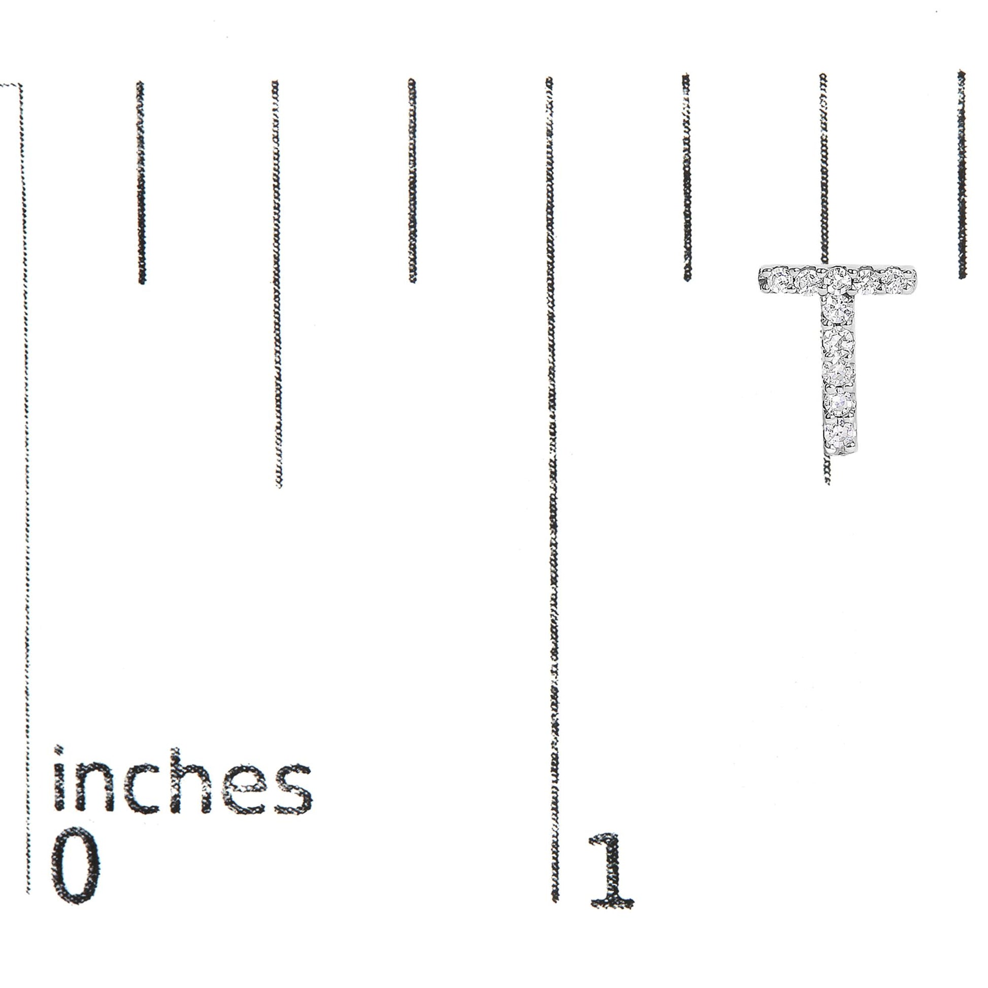Close-up front angle image of a white metal T-shaped stud earring with round white gemstones in micro-pave setting, shown on a scale.
