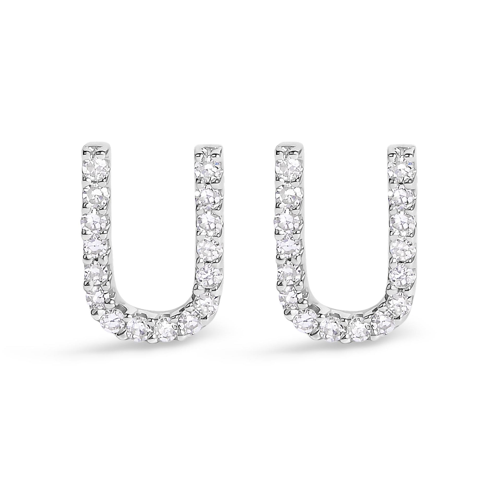 Pair of white metal U-shaped earrings with round white gemstones in a micro-pave setting, shown from the front on a white background.