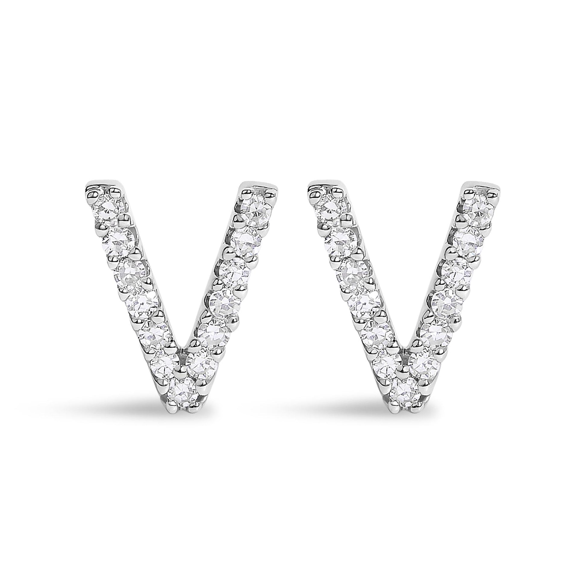 Pair of white metal V-shaped earrings with round white gemstones in a micro-pave setting, front view on a white background.