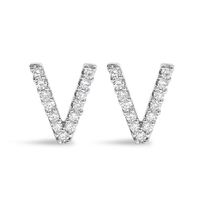 Pair of white metal V-shaped earrings with round white gemstones in a micro-pave setting, front view on a white background.