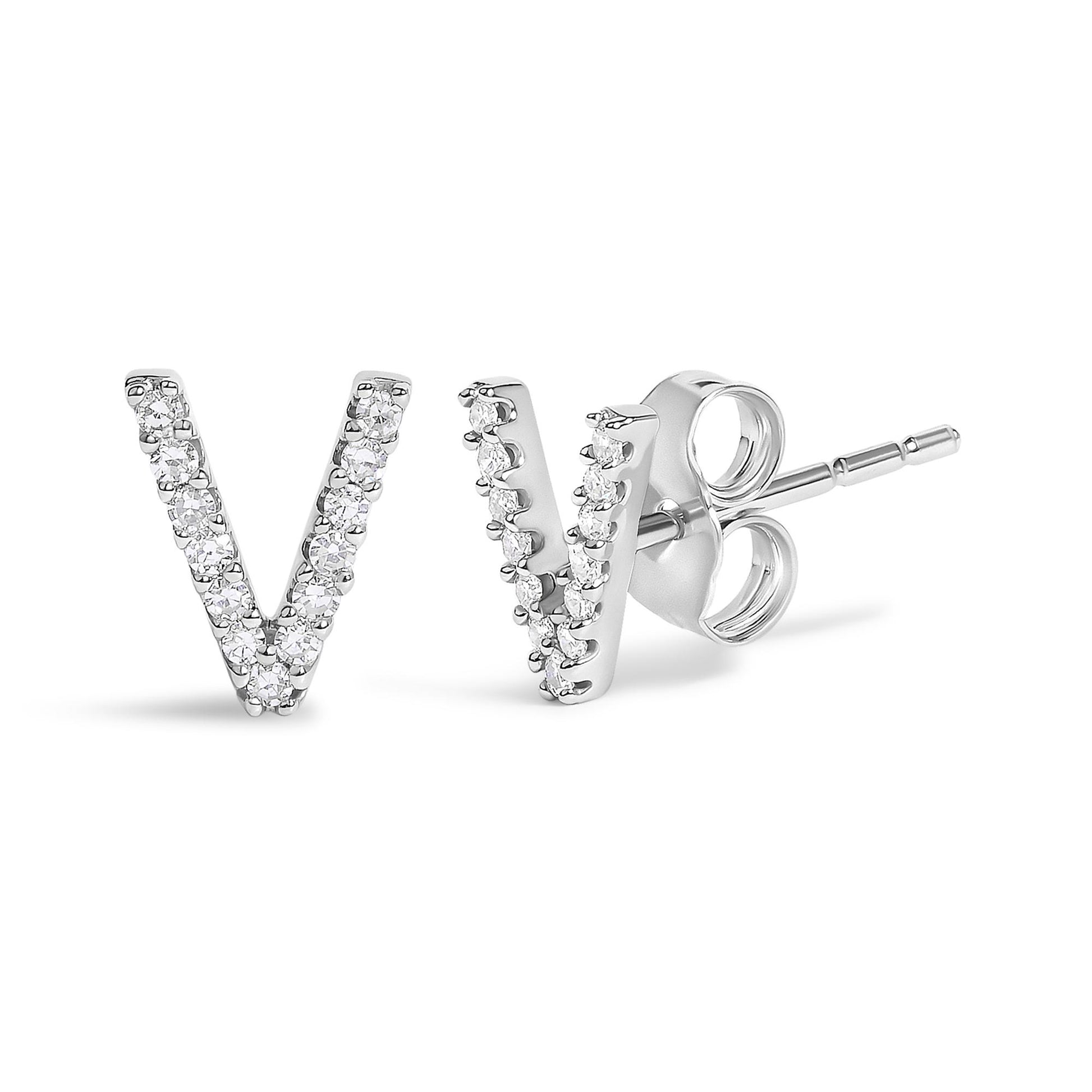 Close-up front and side angle of a single white metal stud earring shaped like the letter V, adorned with multiple round white gemstones in a micro-pave setting.