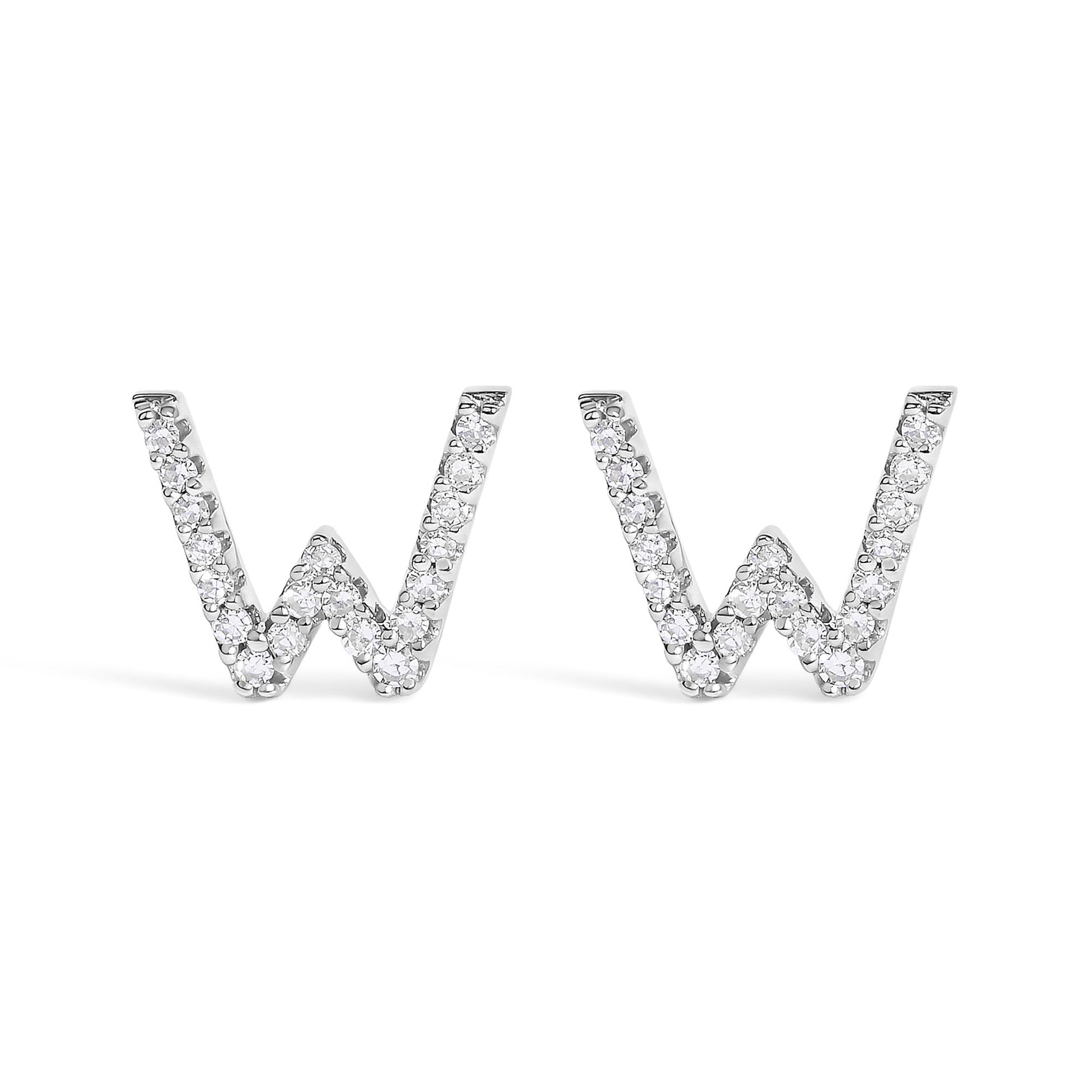 Front view of a pair of white metal earrings shaped like the letter W, adorned with round white gemstones in a micro-pave setting.