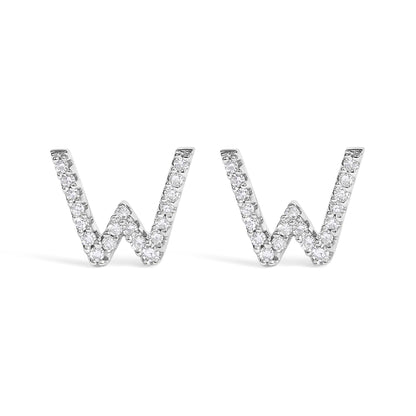 Front view of a pair of white metal earrings shaped like the letter W, adorned with round white gemstones in a micro-pave setting.