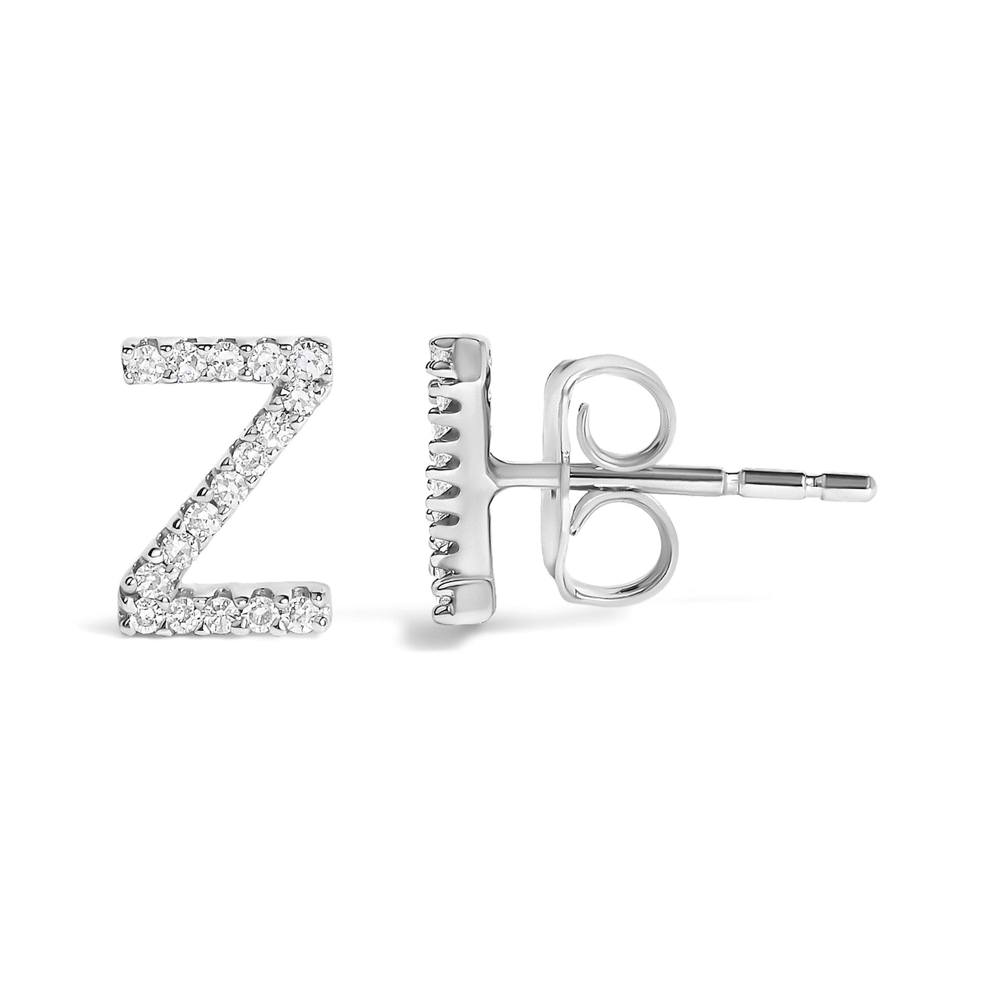 Close-up front and side angled view of a single white metal stud earring shaped like the letter Z, adorned with small round white gemstones in a micro-pave setting.