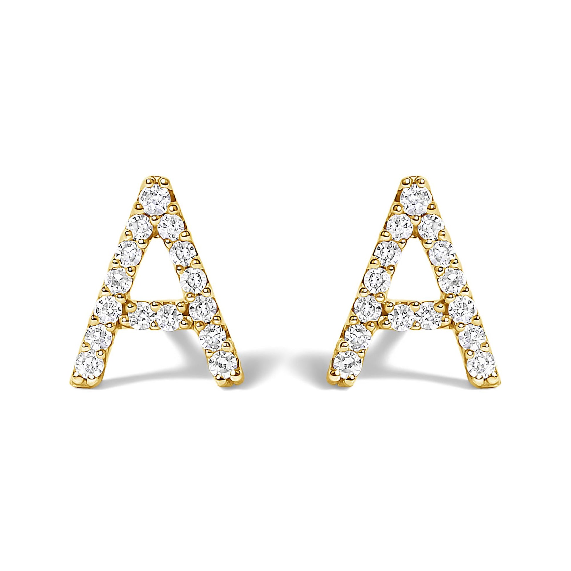Front view of a pair of yellow metal earrings shaped as the letter A, each decorated with multiple round white gemstones in a micro-pave setting.