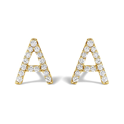 Front view of a pair of yellow metal earrings shaped as the letter A, each decorated with multiple round white gemstones in a micro-pave setting.