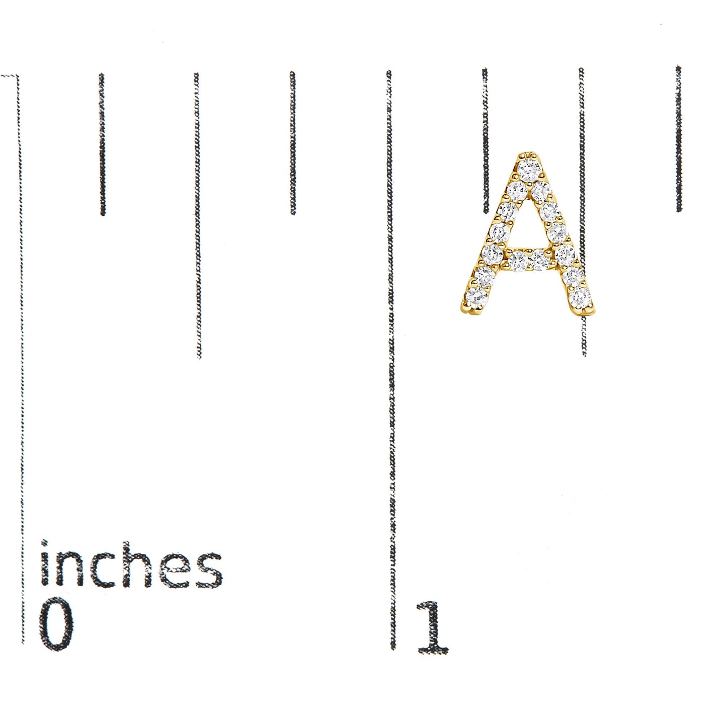 Close-up image of a yellow metal earring shaped like the letter 'A' with white round gemstones in a micro-pave setting, shown on a scale marked in inches.