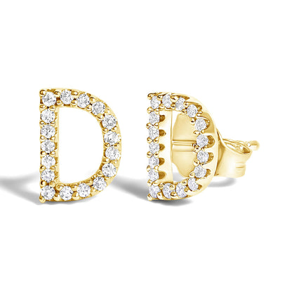 Pair of yellow metal earrings shaped like the letter D, outlined with small round white gemstones, shown from a front and side angle on a white background.