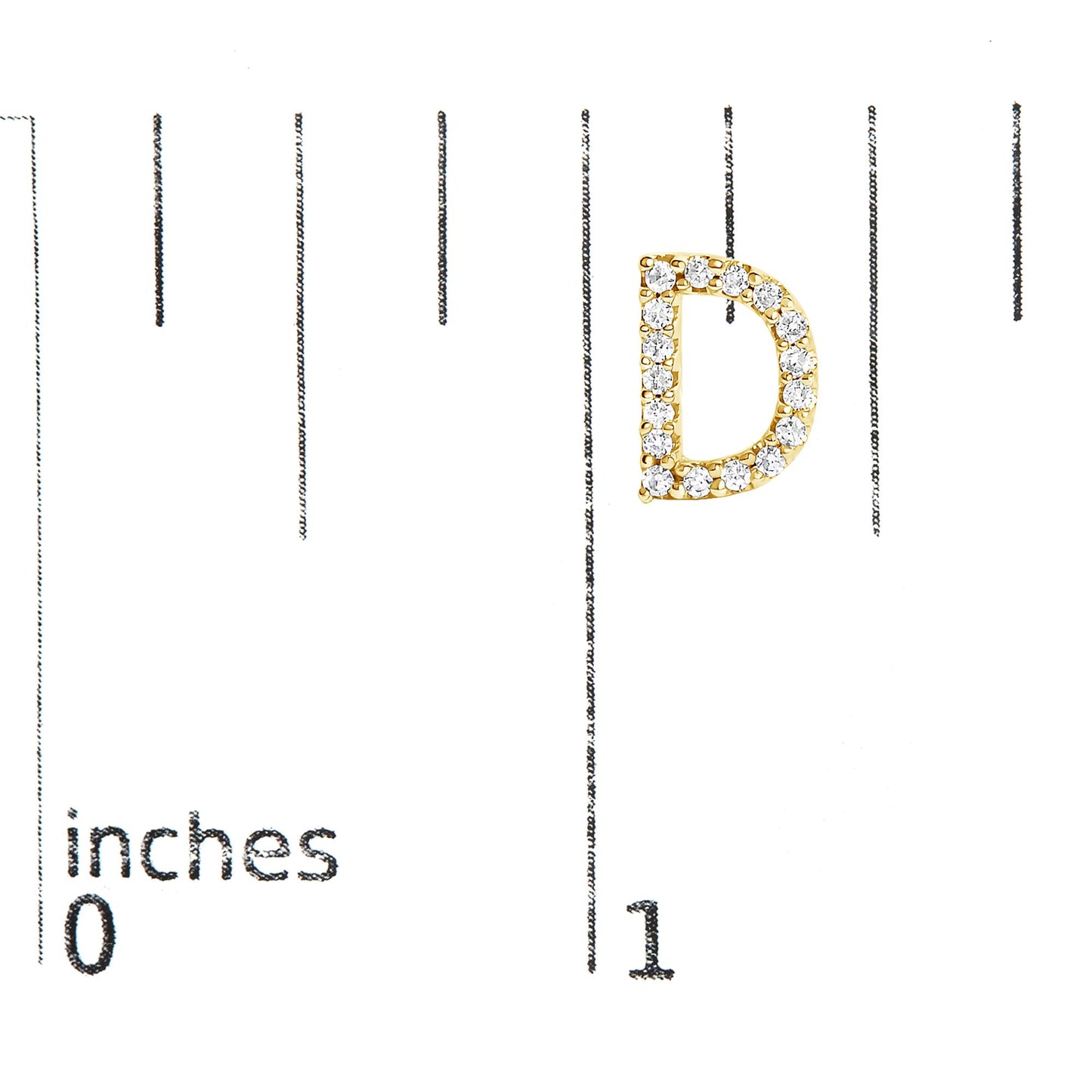 Close-up front view of a yellow metal letter D shaped earring with round white gemstones in a micro-pave setting, shown on a scale.