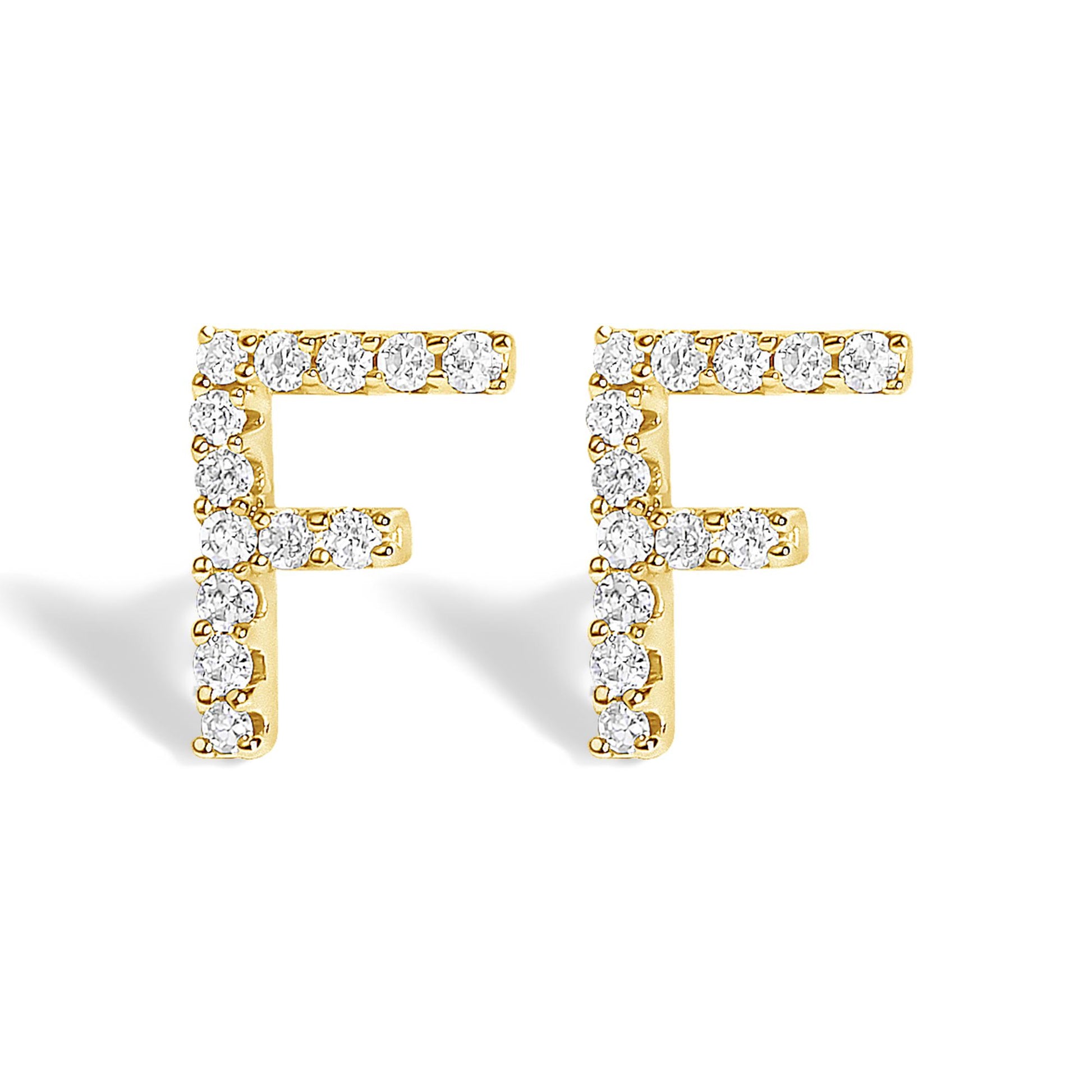 Front-facing view of yellow metal earrings shaped like the letter 'F,' each adorned with small round white gemstones in a micro-pave setting.