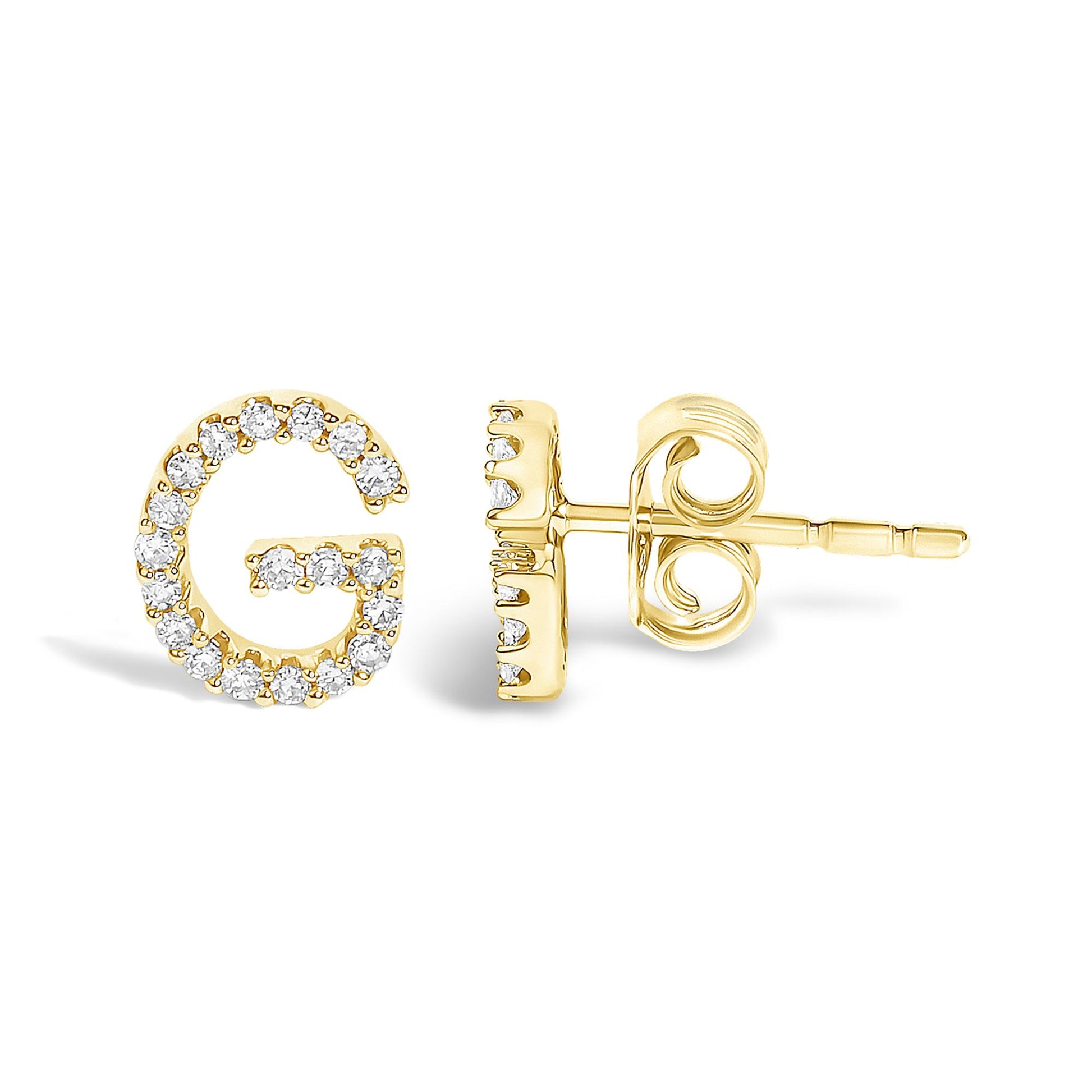 Close-up front and side view of a yellow metal stud earring shaped like the letter G, adorned with white round micro-pave gemstones.