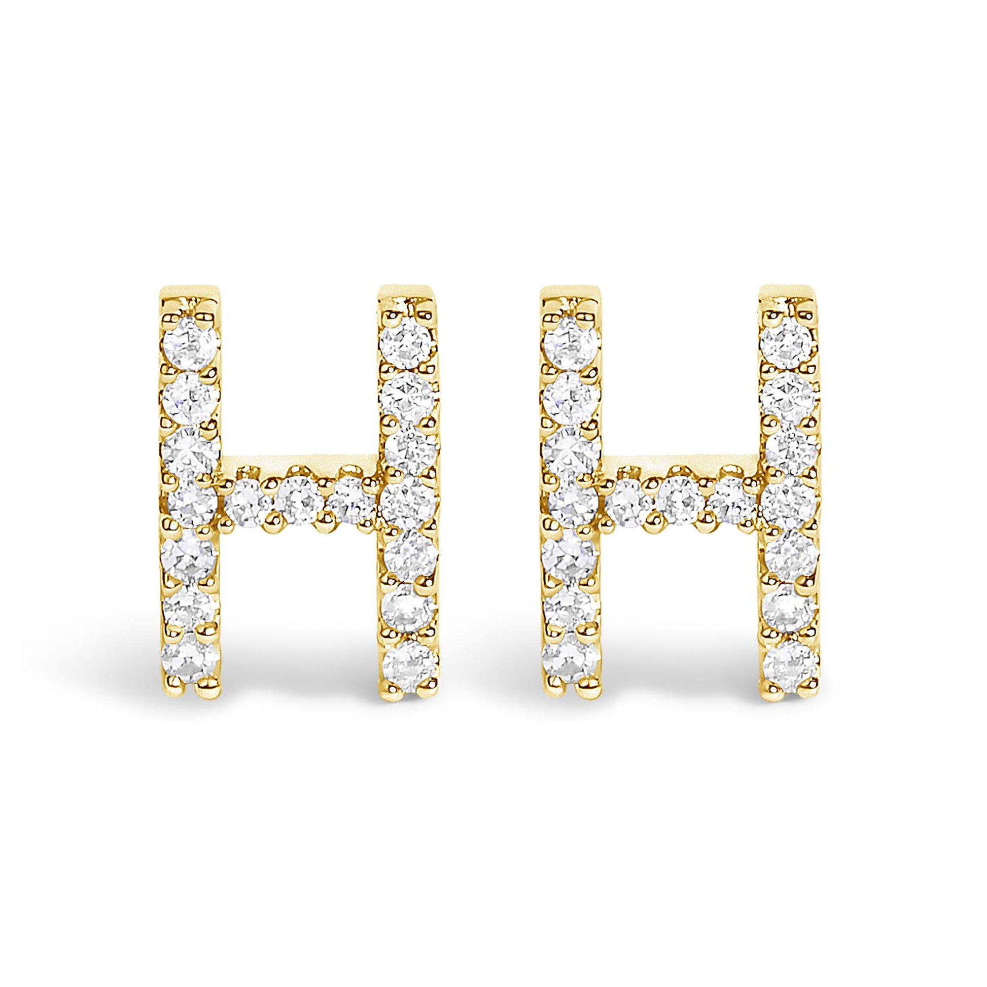 Front view of a pair of yellow metal earrings shaped like the letter H, each adorned with round white gemstones in a micro-pave setting.
