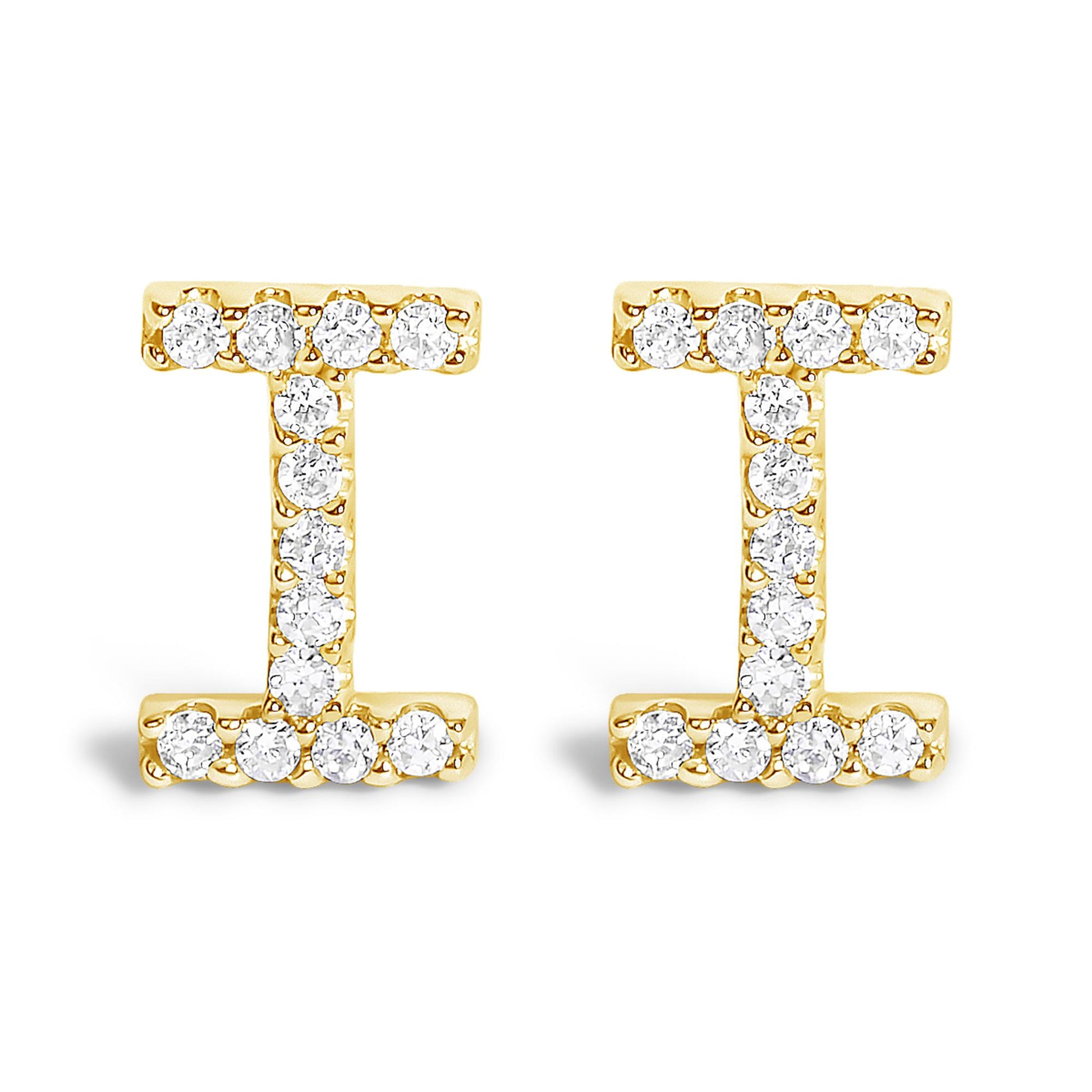 Front view of a pair of yellow metal earrings shaped like the letter 'I,' each adorned with multiple round white gemstones in a micro-pave setting.