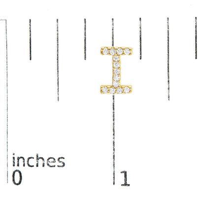 Close-up front view of a yellow metal bar-shaped earring with white round gemstones in a micro-pave setting, shown on a ruler scale.