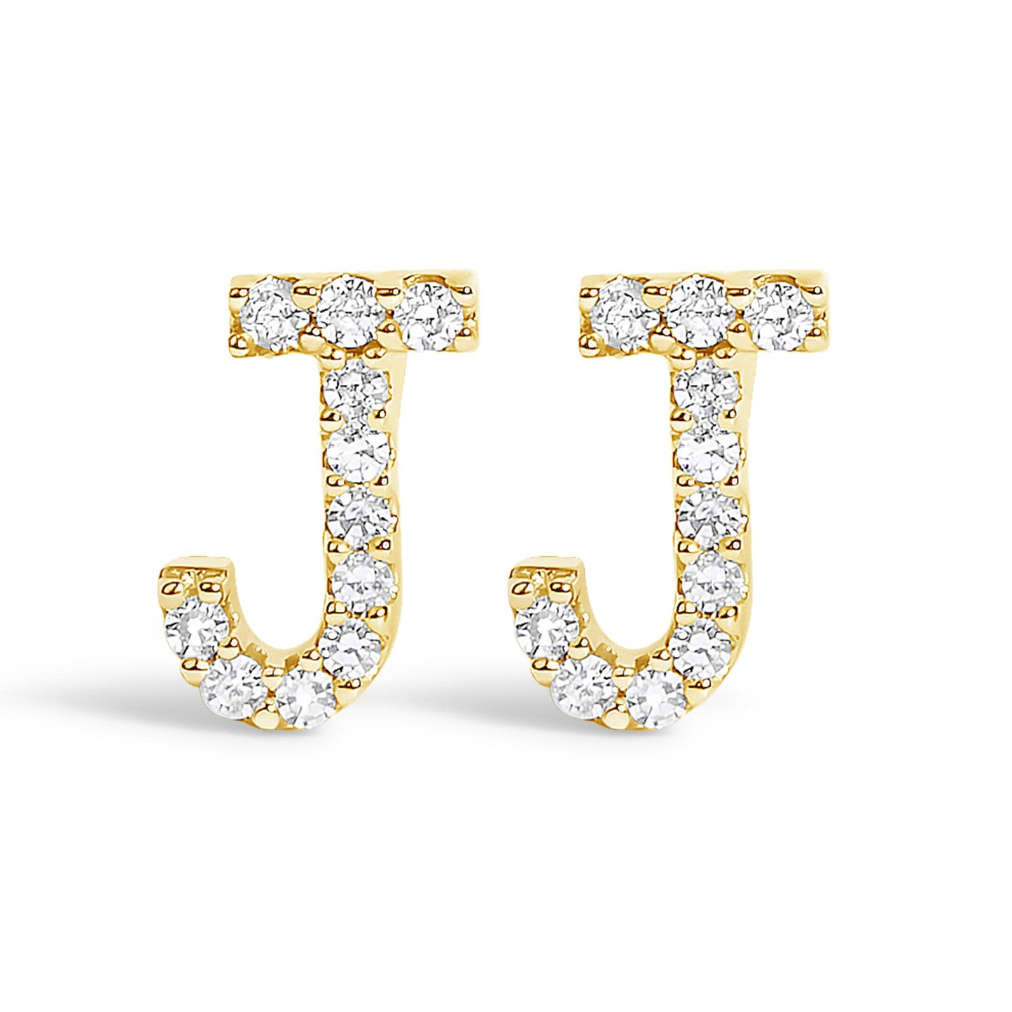 Front view of yellow metal J-shaped earrings adorned with round white gemstones in a micro-pave setting.