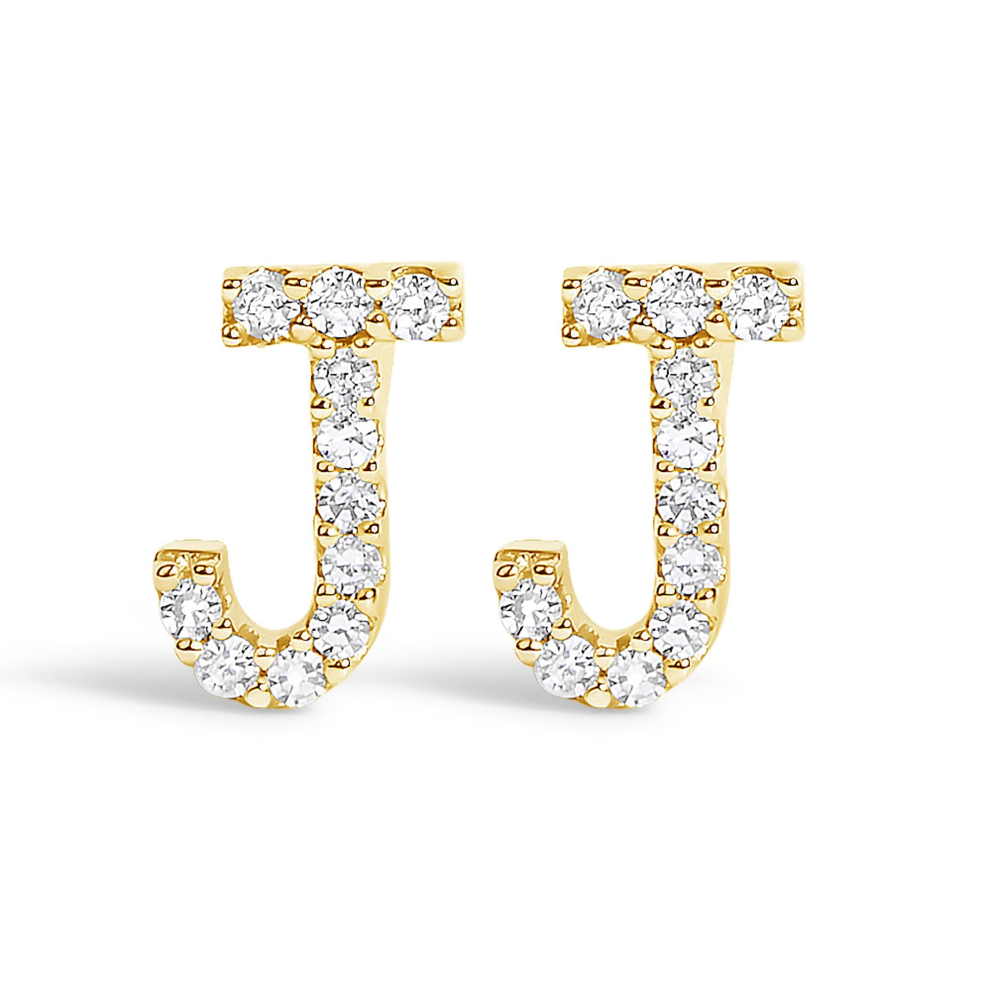 Front view of yellow metal J-shaped earrings adorned with round white gemstones in a micro-pave setting.