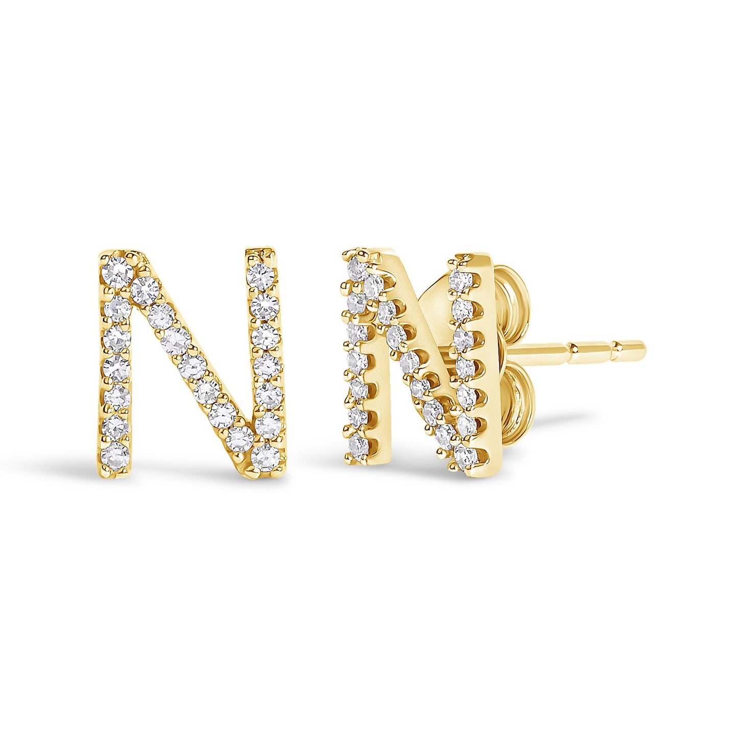 Close-up front and side view of yellow metal stud earrings in the shape of the letter N, each decorated with white round gemstones in a micro-pave setting.