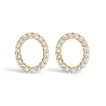 Front view of a pair of yellow metal oval-shaped earrings with round white gemstones in a micro-pave setting encircling the edges, displayed on a white background.