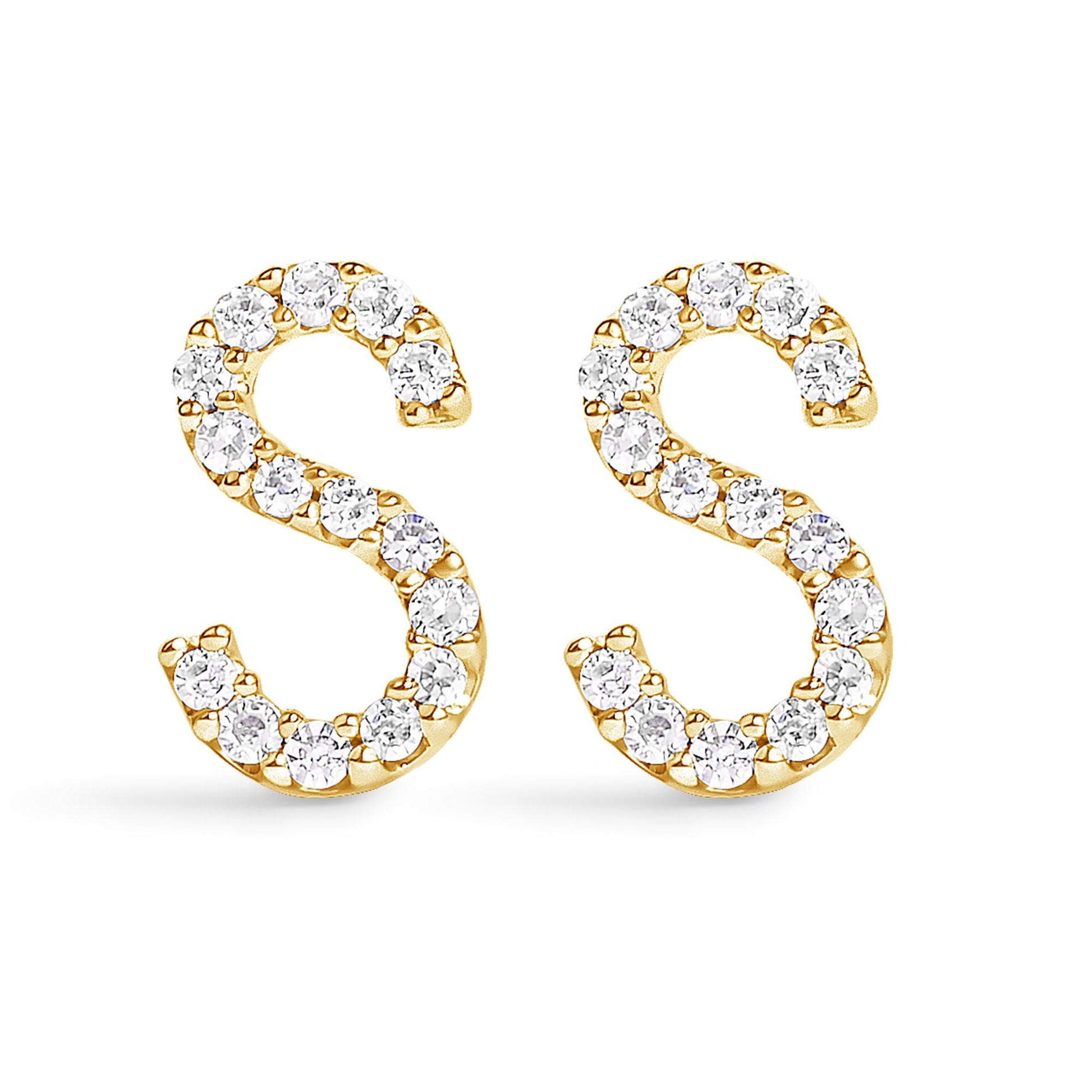 Front view of a pair of yellow metal earrings shaped like the letter 'S,' each adorned with multiple round white gemstones in a micro-pave setting.