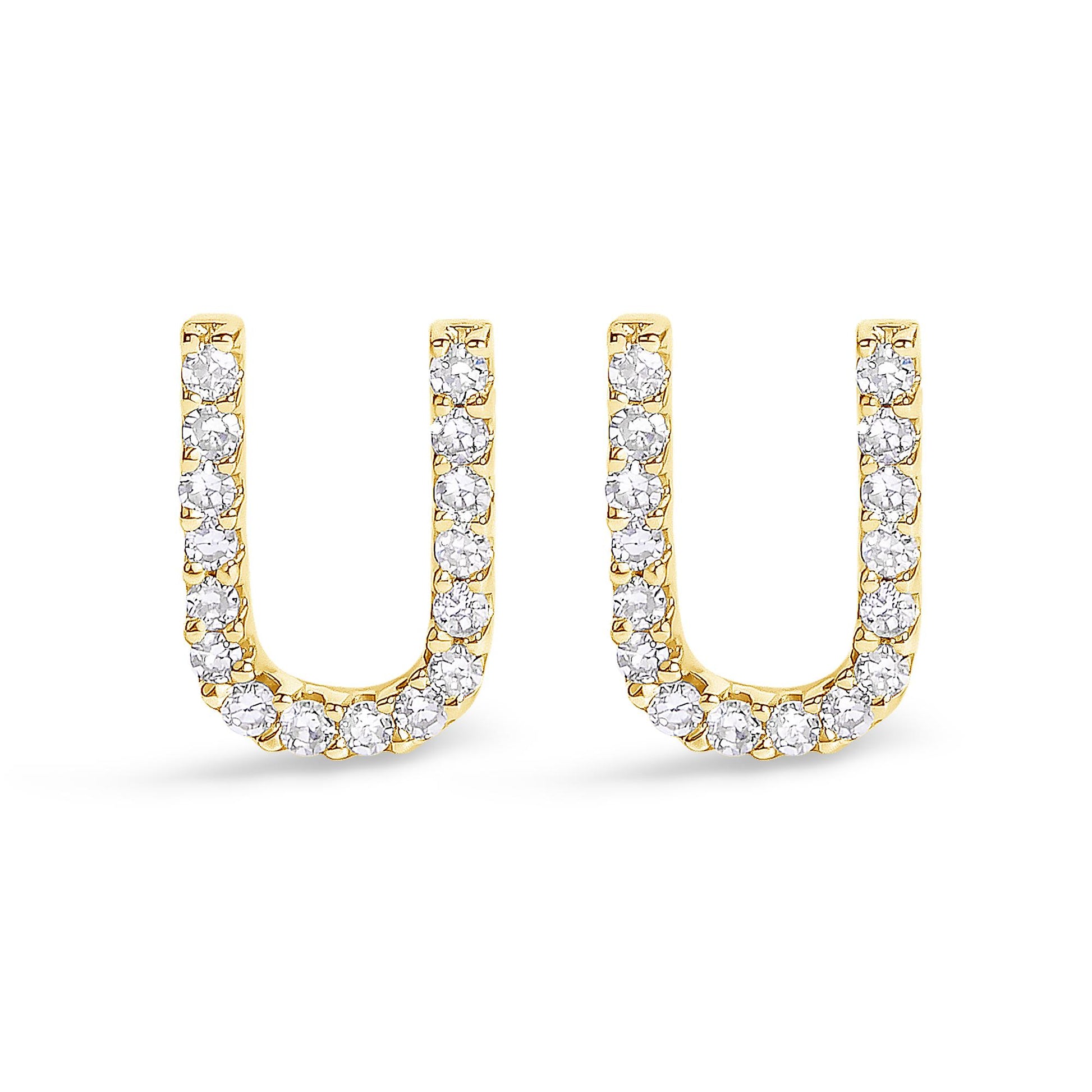 Front view of yellow metal U-shaped earrings with round white gemstones in a micro-pave setting.