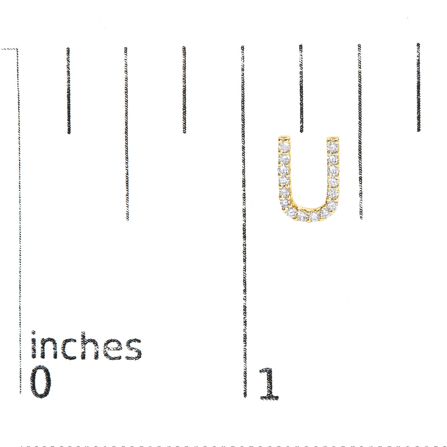 Close-up front angle of a yellow-colored U-shaped earring with round white gemstones in a micro-pave setting, shown on a scale.
