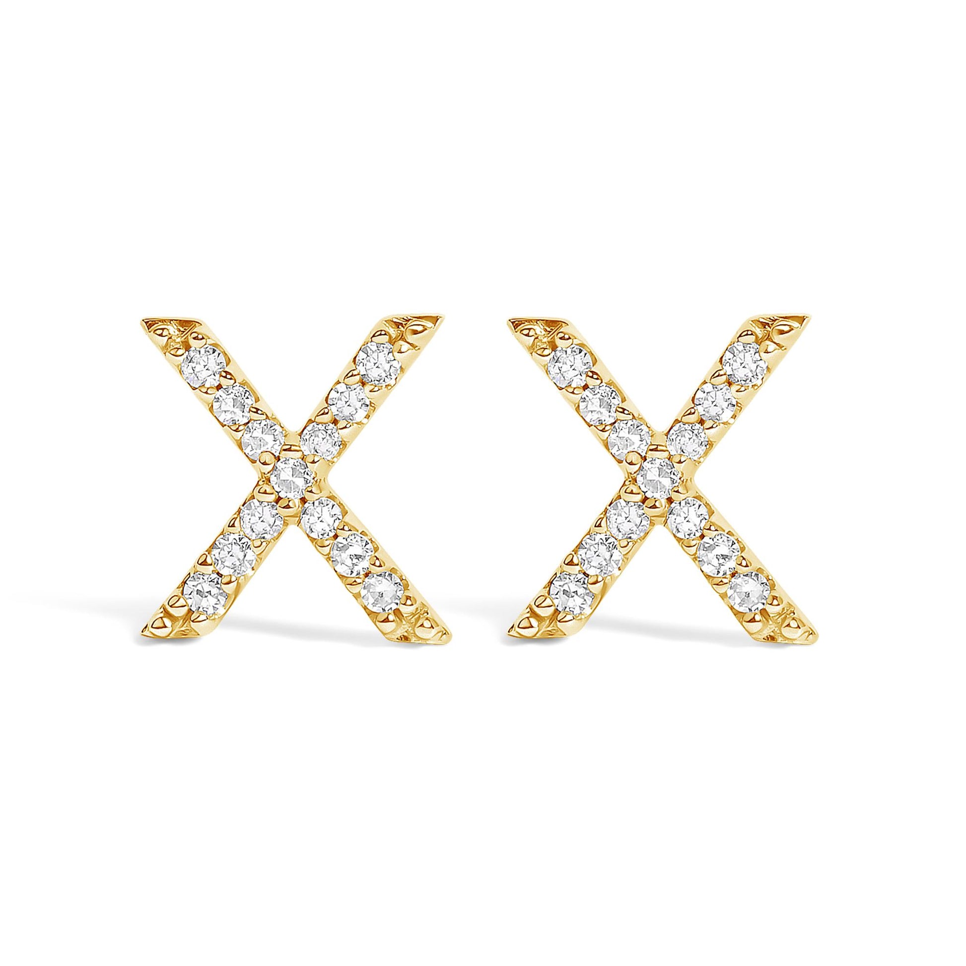 Pair of yellow metal earrings shaped like Xs, each set with round white gemstones, shown in a front-facing angle on a white background.