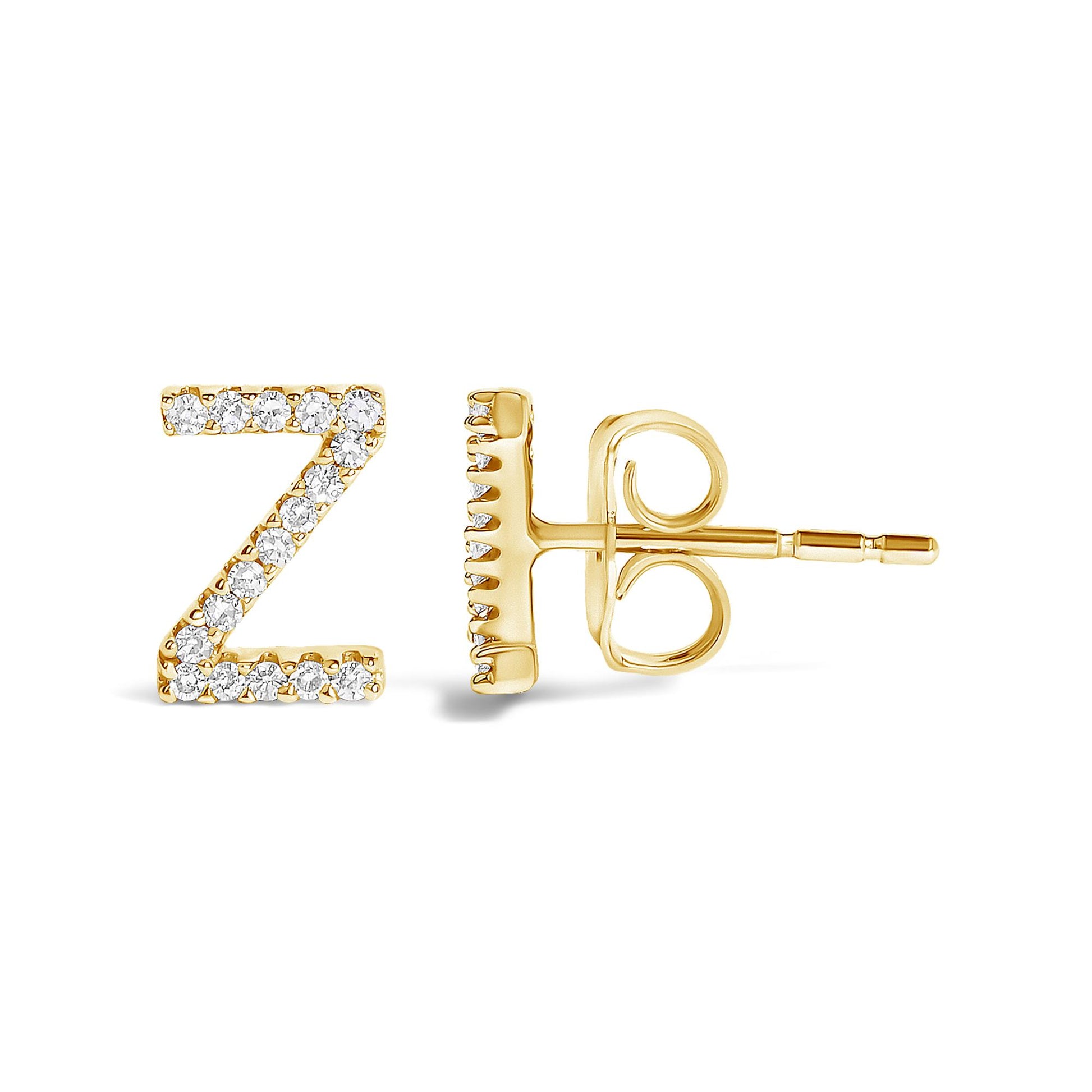 Side view of a yellow metal stud earring shaped like the letter Z, adorned with small round white gemstones in a micro-pave setting.