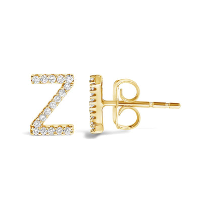 Side view of a yellow metal stud earring shaped like the letter Z, adorned with small round white gemstones in a micro-pave setting.