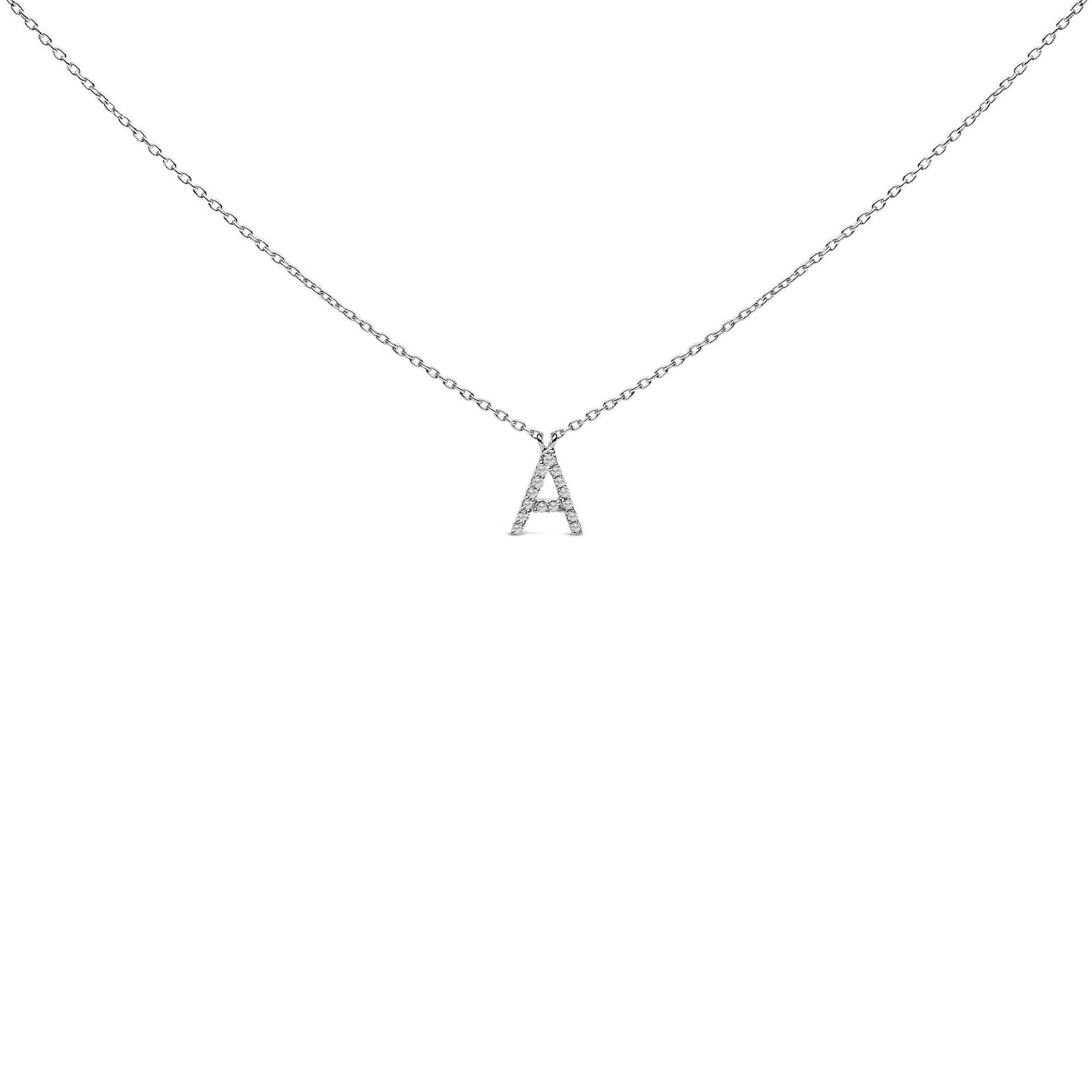 Close-up front view of a white metal necklace with a pendant shaped like the letter 'A' encrusted with small white gemstones in a micro-pave setting. The necklace is shown on a white background.