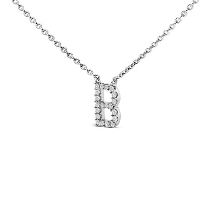 Close-up front view of a white metal necklace with a pendant in the shape of the letter 'R,' outlined with round white gemstones in a micro-pave setting.