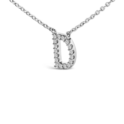 Close-up front angle of a white metal necklace featuring a pendant in a hollow oval shape adorned with round white gemstones in micro-pave setting along the perimeter, shown on a white background.