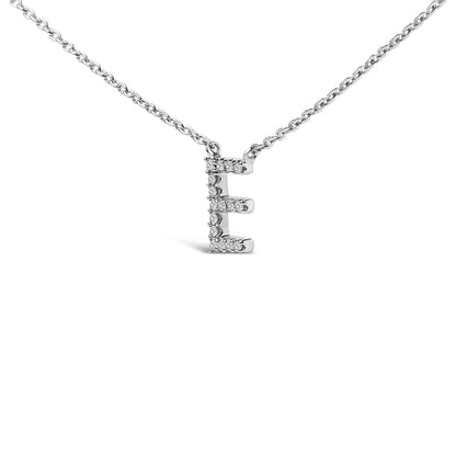 Close-up front view of a white metal necklace with a pendant in the shape of the letter 'E' adorned with white round gemstones in a micro-pave setting.