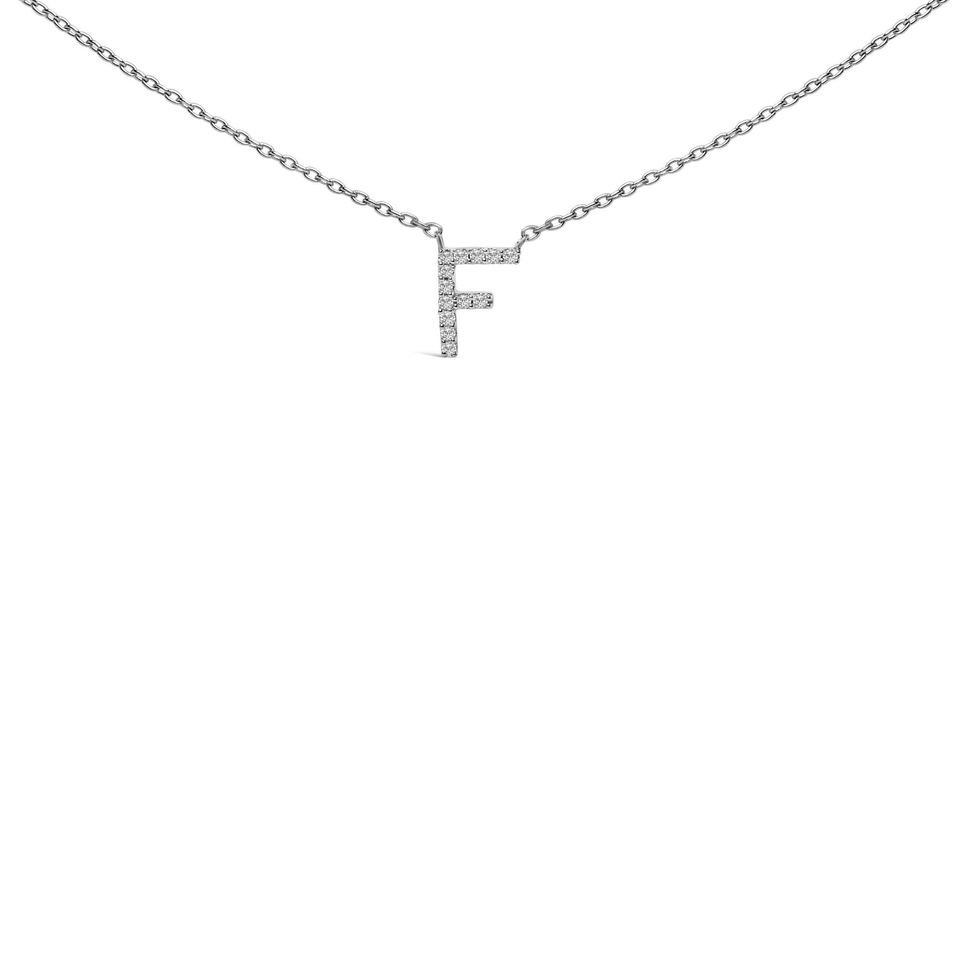 White metal necklace with a pendant in the shape of the letter 'F' set with small white gemstones in a micro-pave setting, shown in a front-facing close-up shot on a white background.