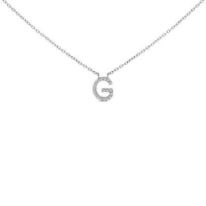 Close-up front view of a white necklace chain with a pendant in the shape of the letter G, featuring round white gemstones in a micro-pave setting.