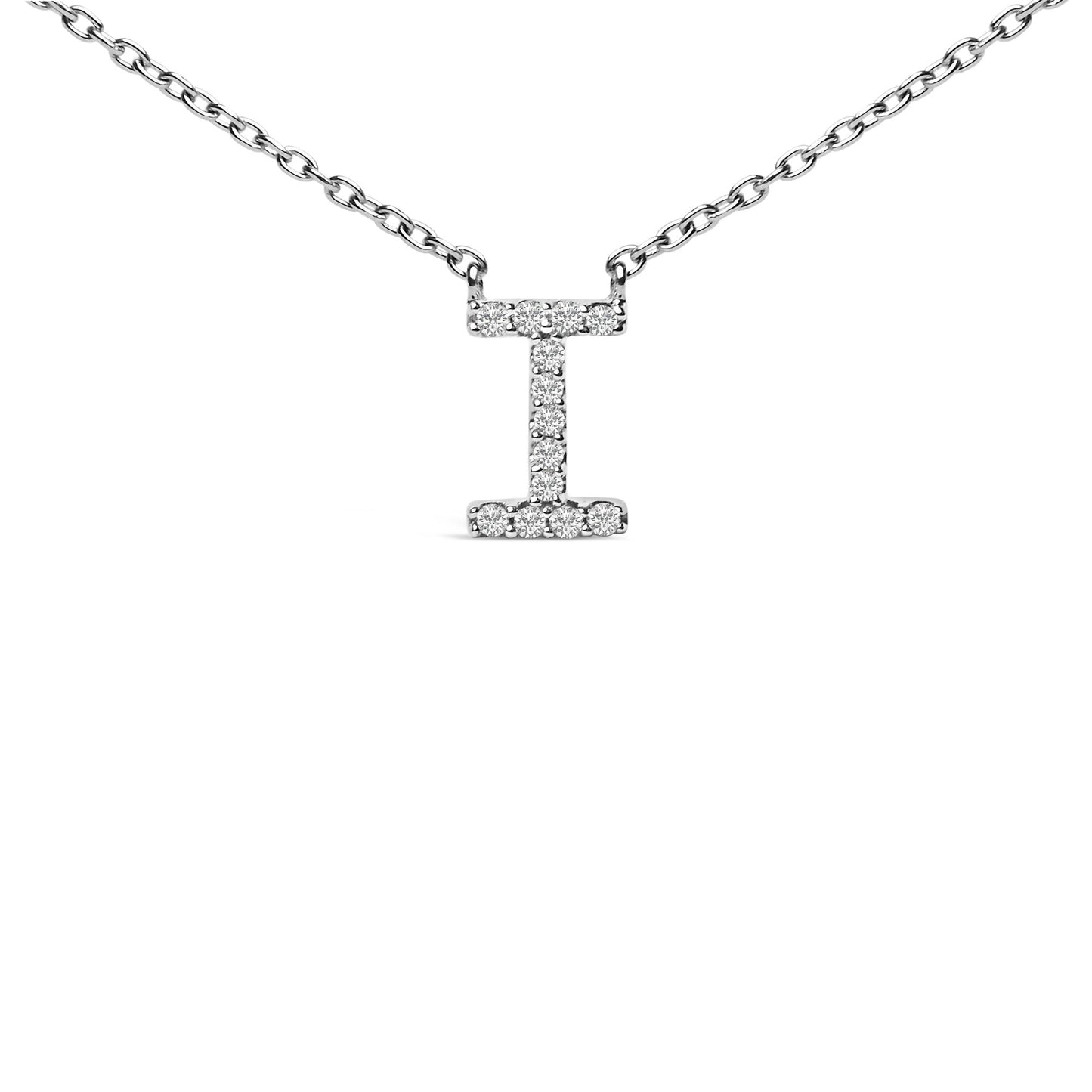 Close-up front view of a white metal necklace with a vertical bar pendant shaped like the letter 'I,' adorned with small round white gemstones in a micro-pave setting along the pendant's surface.
