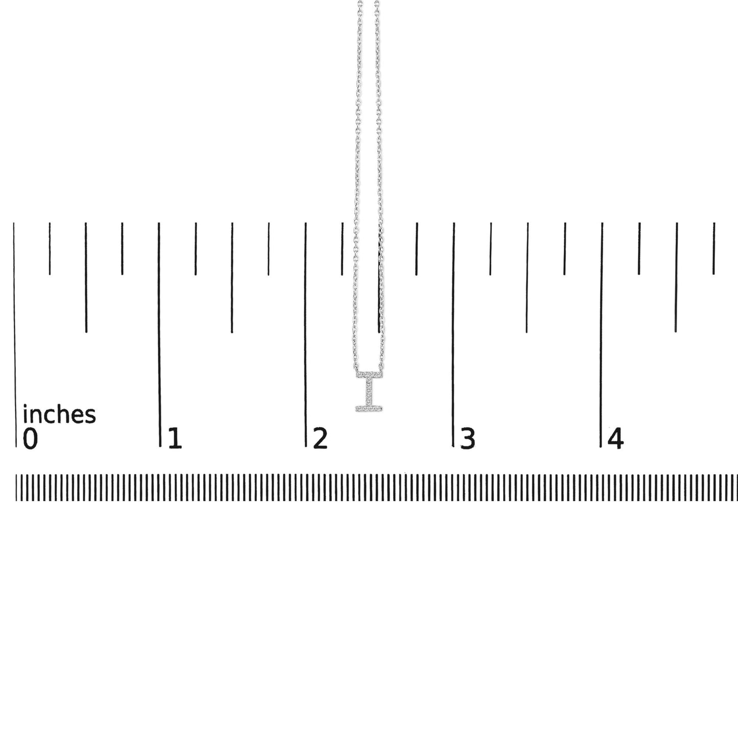 Close-up front view of a white necklace with a micro-pave pendant set with small round white gemstones, shown on a measuring scale.