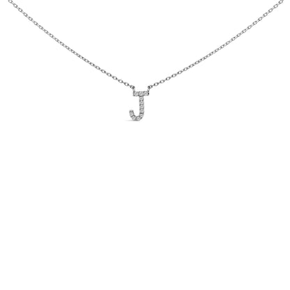 Close-up front view of a white metal necklace with a pendant shaped like the letter 'J' adorned with round white gemstones in a micro-pave setting.