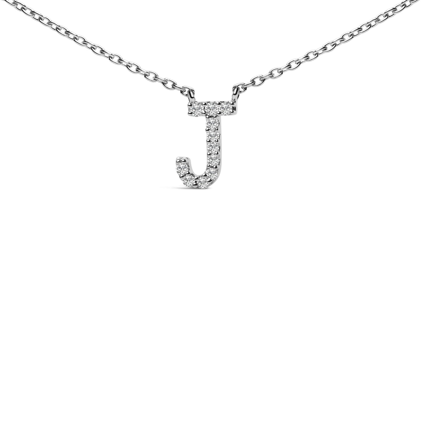 Close-up front view of a white metal necklace with a pendant in the shape of the letter 'J' adorned with round white gemstones in a micro-pave setting, shown on a white background.