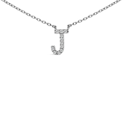 Close-up front view of a white metal necklace with a pendant in the shape of the letter 'J' adorned with round white gemstones in a micro-pave setting, shown on a white background.