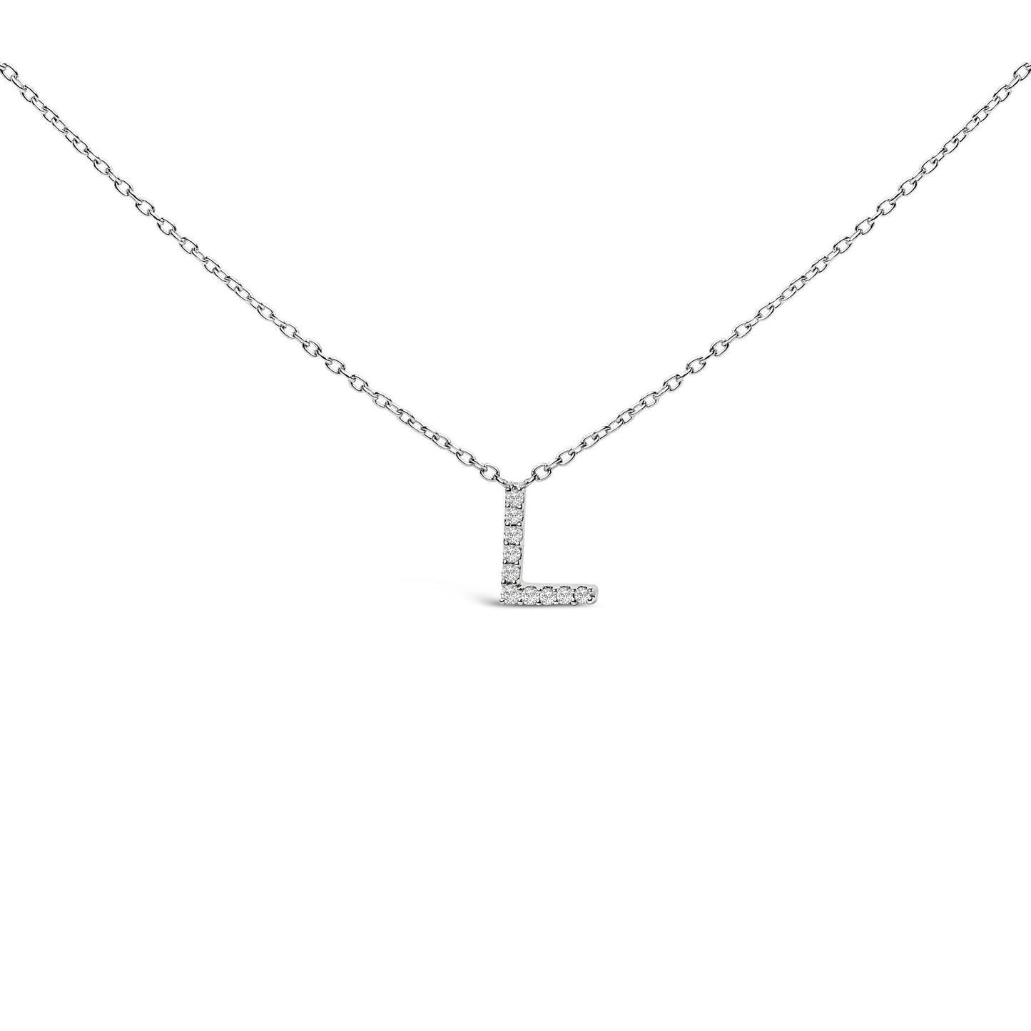 Close-up front view of a white necklace chain with an L-shaped pendant covered in round white gemstones in micro-pave setting.
