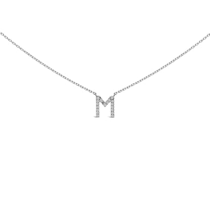 Close-up front view of a white necklace chain with a pendant in the shape of the letter 'M' adorned with small white gemstones in a micro-pave setting.