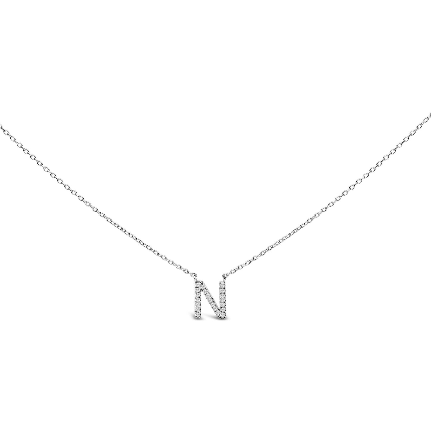 Close-up front view of a white necklace pendant in the shape of the letter 'N' covered with round white gemstones in micro-pave setting, shown against a white background.