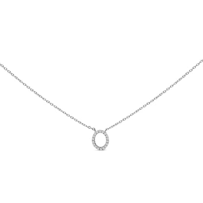 Close-up front view of a white metal necklace with an oval pendant featuring multiple white gemstones in a micro-pave setting, shown on a white background.