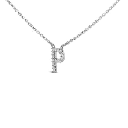 Close-up front angle of a white metal necklace with a pendant in the shape of a letter outlined with small white gemstones in a micro-pave setting.