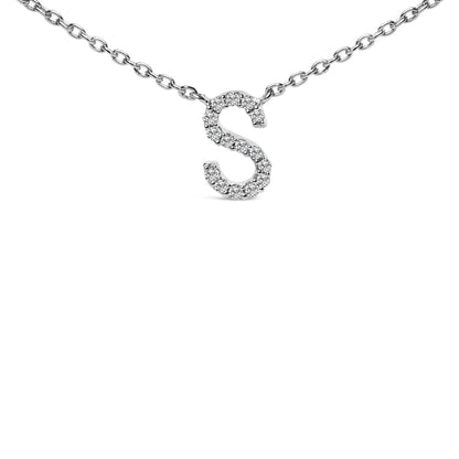 Close-up front view of a white metal necklace with a pendant shaped like the letter 'S' adorned with round white gemstones in a micro-pave setting.