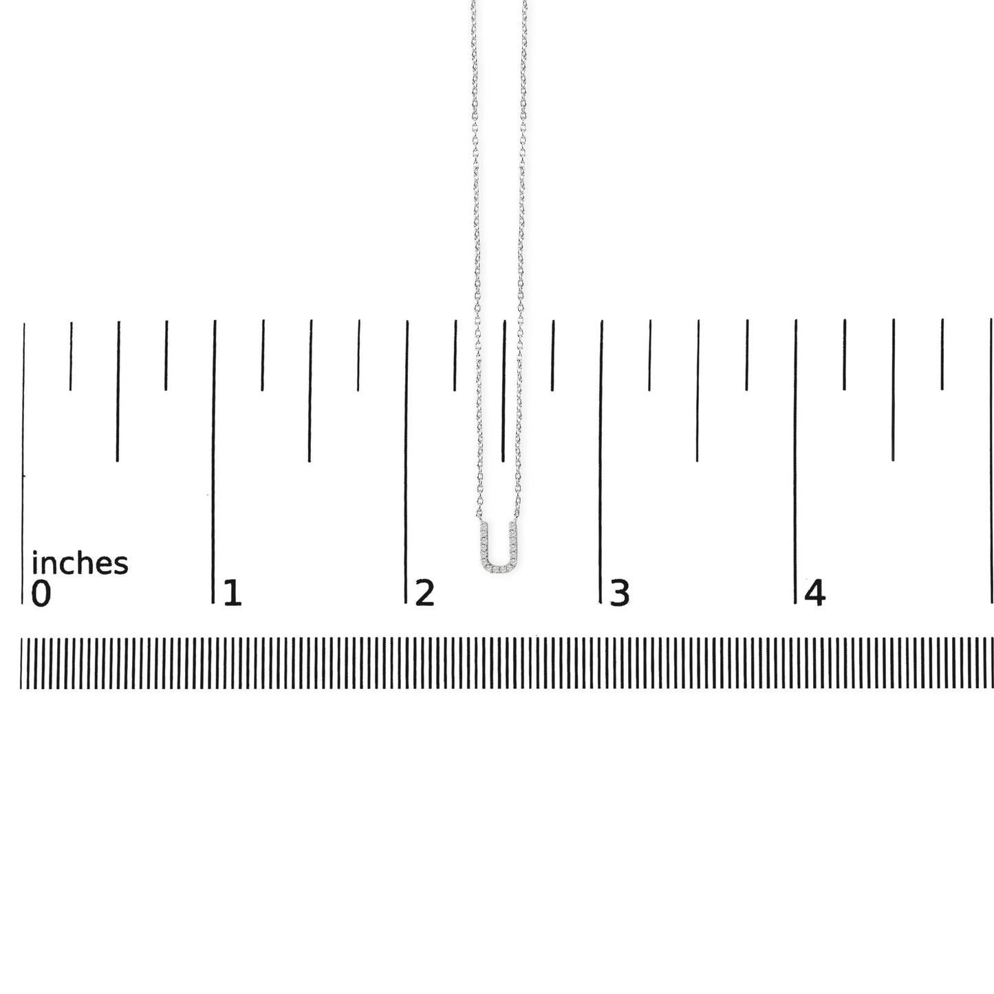 White necklace with a U-shaped pendant featuring white round gemstones in a micro-pave setting, shown flat on a ruler scale, front view.