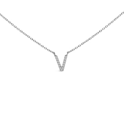 Close-up front view of a white metal necklace with a V-shaped pendant featuring micro-pave set round white gemstones, displayed on a white background.