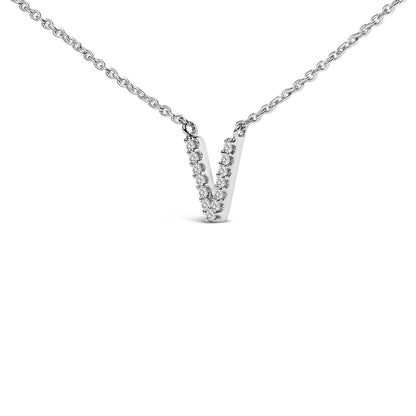 Close-up, front view of a white metal necklace with a V-shaped pendant adorned with small white gemstones in a micro-pave setting.