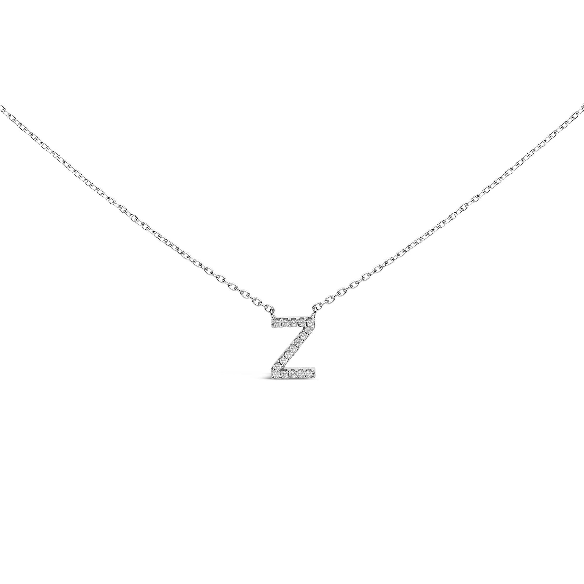 Close-up front view of a white necklace chain with a pendant in the shape of the letter Z, adorned with multiple small white gemstones in a micro-pave setting, shown on a white background.